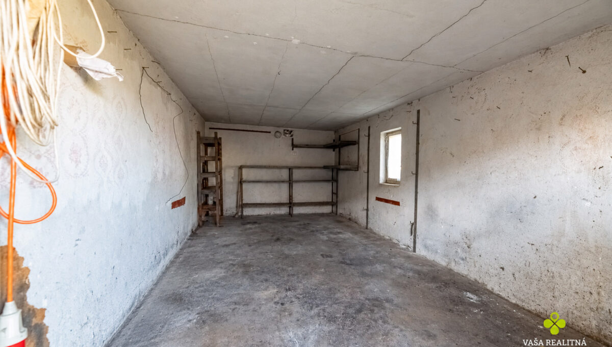 Empty garage with logo intact