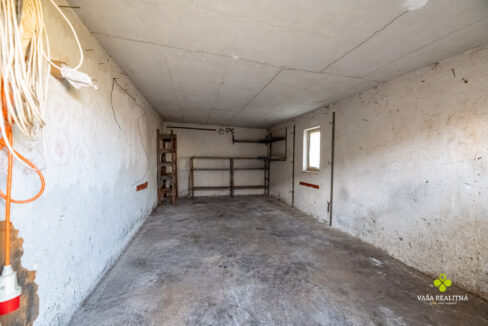 Empty garage with logo intact