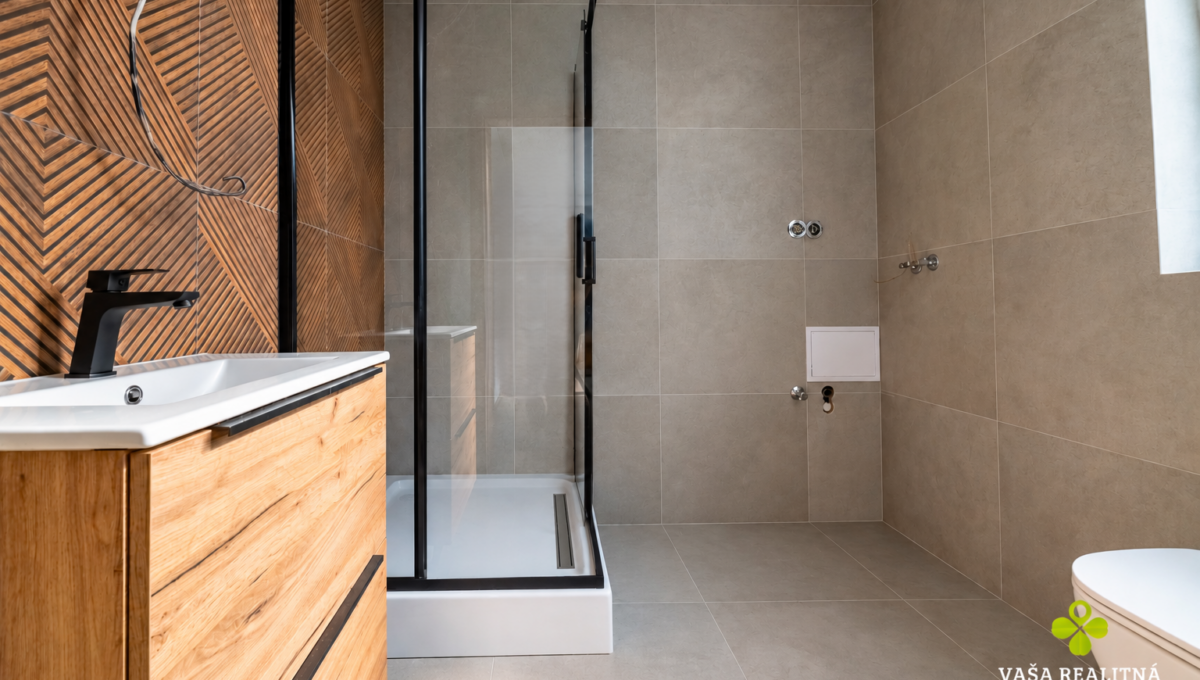 Modern Bathroom with Glass Shower and Linear Drain