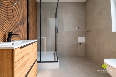 Modern Bathroom with Glass Shower and Linear Drain
